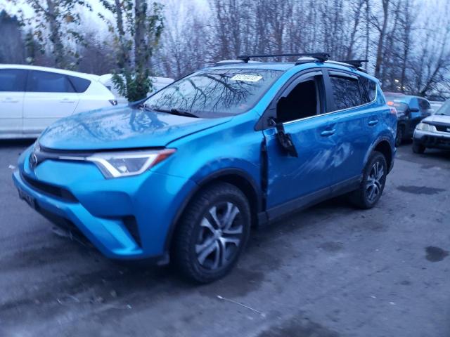 2T3ZFREV1JW502883 | 2018 TOYOTA RAV4 LE